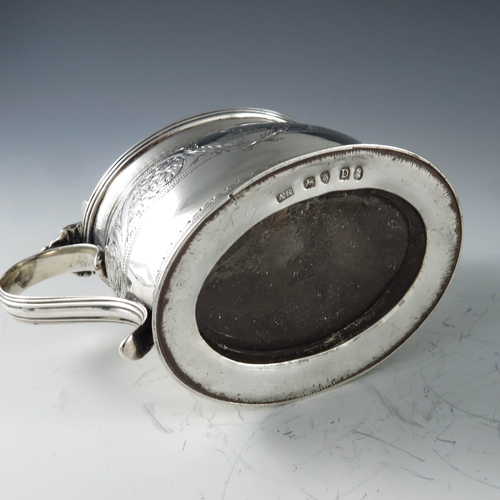 2053 - Abstinando King, London 1799, a George III silver mustard pot, bright cut oval ogee cylinder form, d... 