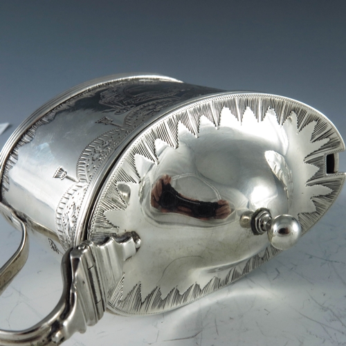 2054 - Robert Hennell, London 1790, a George III silver mustard pot, straight sided oval form, bright cut t... 