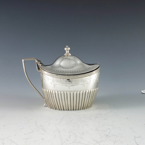 2056 - Peter, Ann and William Bateman, London 1801, a George III silver mustard pot, oval boat form with do... 