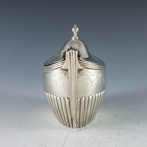 2056 - Peter, Ann and William Bateman, London 1801, a George III silver mustard pot, oval boat form with do... 