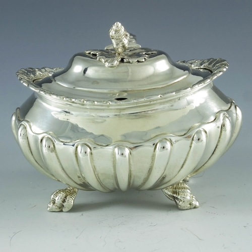 2059 - Joseph Biggs (attributed), London 1820, a George III silver mustard pot, ovoid shouldered form with ... 