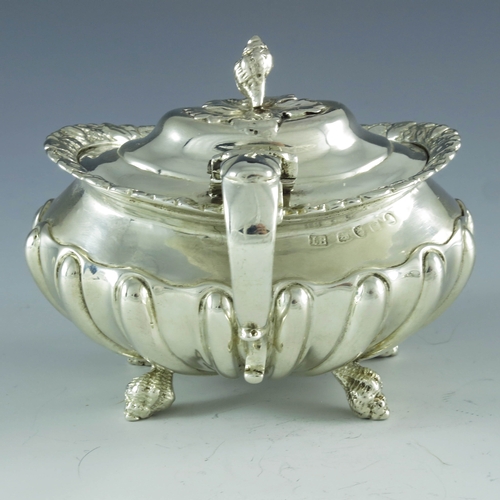 2059 - Joseph Biggs (attributed), London 1820, a George III silver mustard pot, ovoid shouldered form with ... 