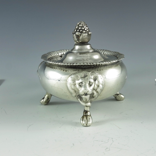 2060 - S C Younge and Co., Sheffield 1813, a George III silver mustard pot, squat ovoid form, on three lion... 