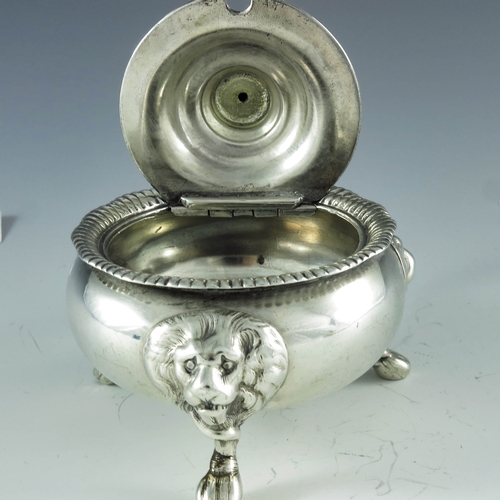 2060 - S C Younge and Co., Sheffield 1813, a George III silver mustard pot, squat ovoid form, on three lion... 