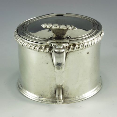 2062 - Matthew Boulton, Birmingham 1816, a George III silver mustard pot, drum form, with gadrooned border,... 