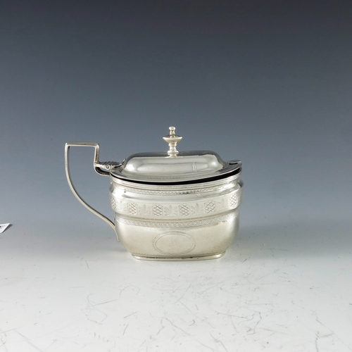 2068 - Charles Chesterman II, London 1807, a George III silver mustard pot, of oval navette form, bright cu... 