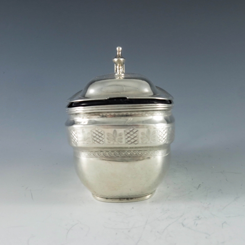 2068 - Charles Chesterman II, London 1807, a George III silver mustard pot, of oval navette form, bright cu... 