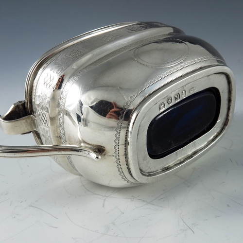 2068 - Charles Chesterman II, London 1807, a George III silver mustard pot, of oval navette form, bright cu... 