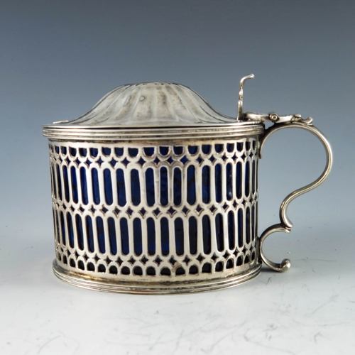 2070 - Andrew Fogelberg, London 1791, a George III silver mustard pot of straight sided oval form pierced w... 