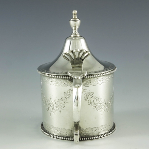 2074 - Hester Bateman, London 1781, a George III silver mustard pot, cylindrical form with flared conical l... 