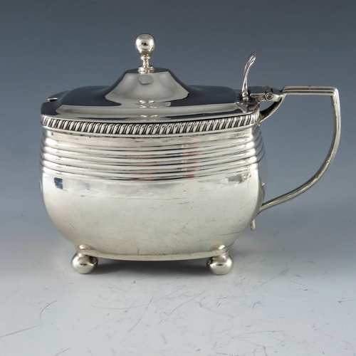 2079 - Crispin Fuller, London 1808, a George III silver mustard pot, bowed cuboid form with ribbed upper se... 