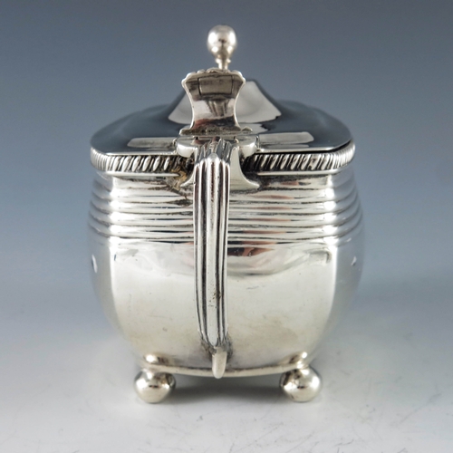 2079 - Crispin Fuller, London 1808, a George III silver mustard pot, bowed cuboid form with ribbed upper se... 