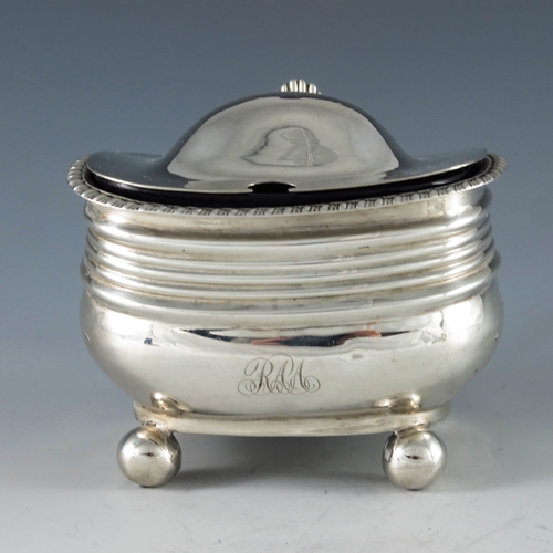 2080 - Unknown, London 1818, a George III silver mustard pot, rectangular ribbed baluster form, on four sph... 