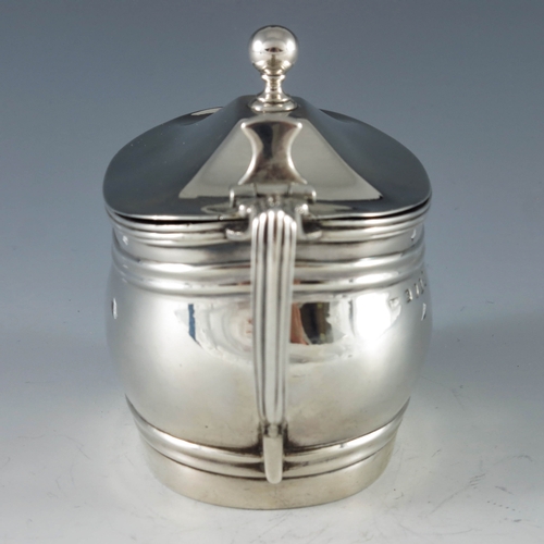 2081 - Thomas Robinson, London 1806,  George III silver mustard pot, ribbed ovoid boat form, reeded angular... 