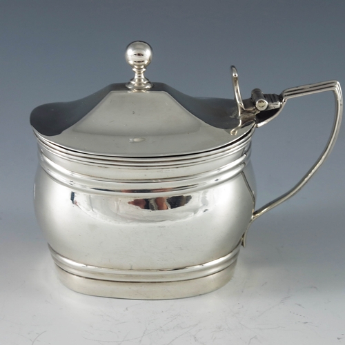 2081 - Thomas Robinson, London 1806,  George III silver mustard pot, ribbed ovoid boat form, reeded angular... 