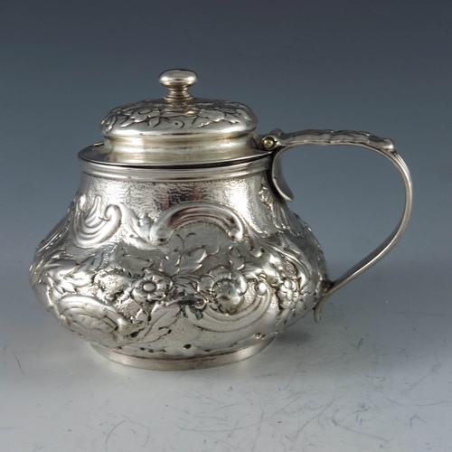 2082 - Rebecca Emes and Edward Barnard, London 1819, a George III silver mustard pot, bulbous form, embosse... 