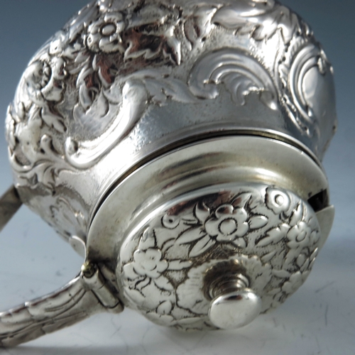 2082 - Rebecca Emes and Edward Barnard, London 1819, a George III silver mustard pot, bulbous form, embosse... 