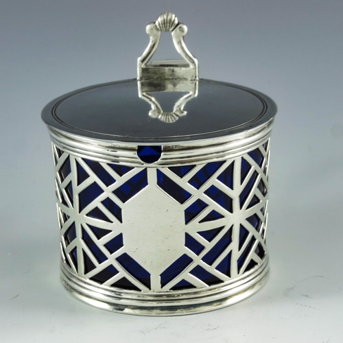 2087 - Edward Aldridge, London 1766, a George III silver mustard pot, cylindrical form, reticulated geometr... 