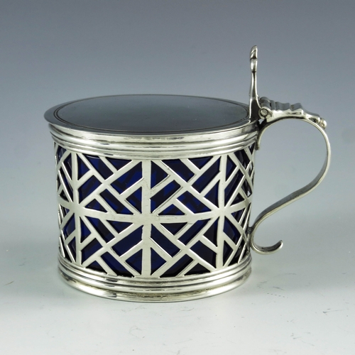 2087 - Edward Aldridge, London 1766, a George III silver mustard pot, cylindrical form, reticulated geometr... 