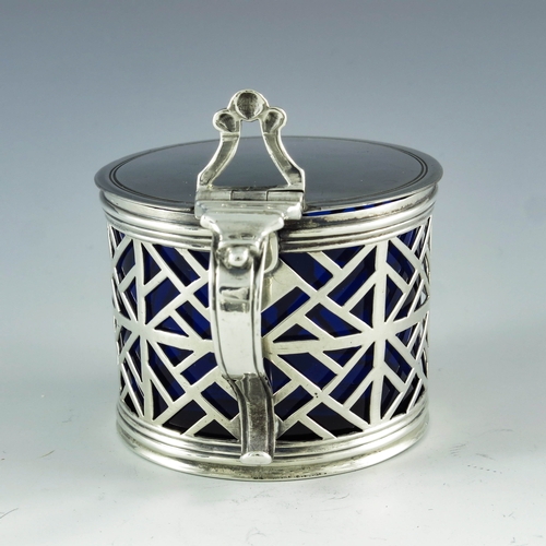 2087 - Edward Aldridge, London 1766, a George III silver mustard pot, cylindrical form, reticulated geometr... 