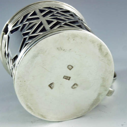 2087 - Edward Aldridge, London 1766, a George III silver mustard pot, cylindrical form, reticulated geometr... 