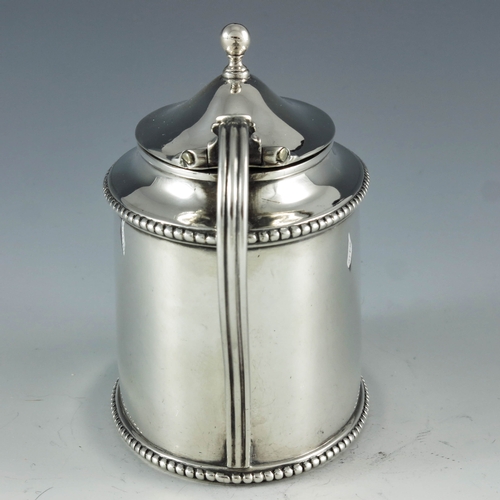 2093 - Edward Capper, London 1795, a George III silver mustard pot of plain oval form with beaded borders, ... 