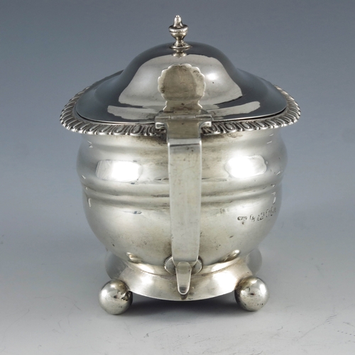 2095 - Thomas Watson, Newcastle 1801, a George III Provincial oval silver mustard pot with moulded girdle a... 