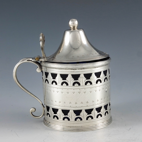 2100 - Peter and Ann Bateman, London 1791, a George III silver mustard pot, cylindrical form with flared co... 