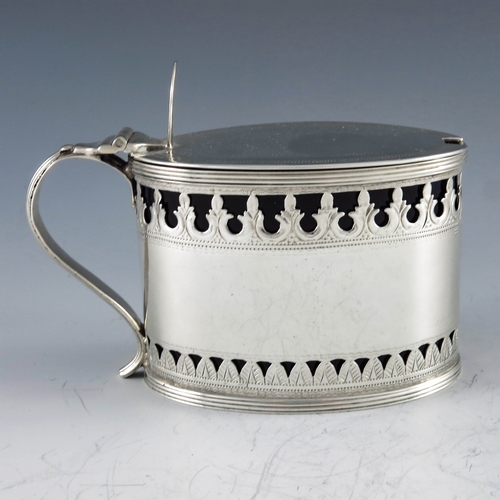 2101 - Charles Chesterman II, London 1790, a George III silver mustard pot, straight sided oval form, brigh... 