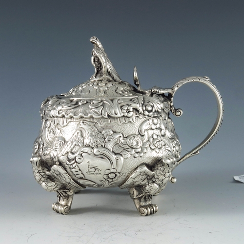 2102 - William Eaton, London 1820, a George III silver mustard pot, squat baluster inverse pear form, heavi... 