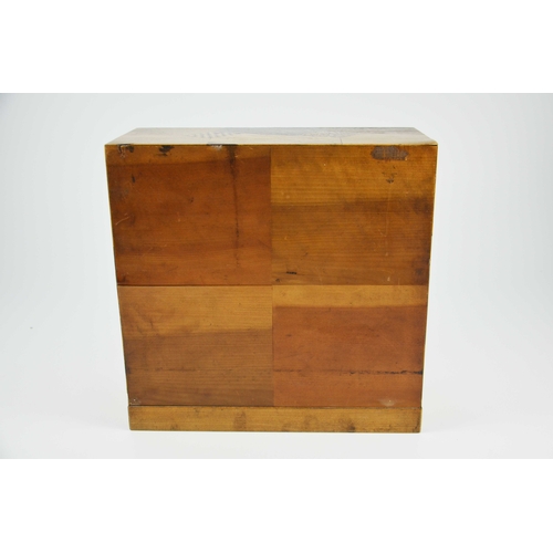 475 - A Japanese Hakone parquetry small chest of five short over one long drawers, each with different geo... 