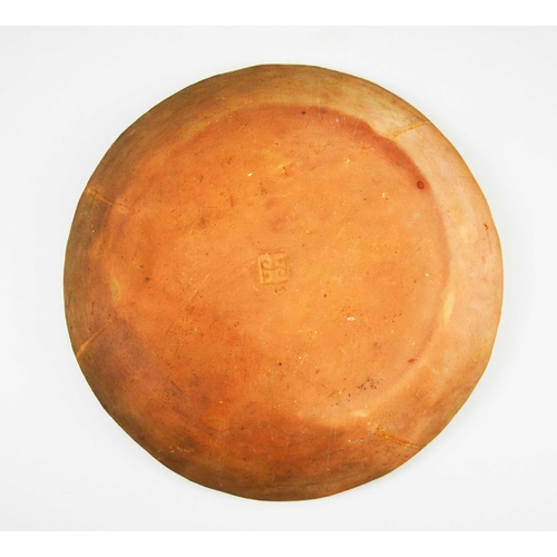 1400 - Bernard Leach (attributed), a St Ives studio pottery slipware dish, circa 1934, circular form, decor... 