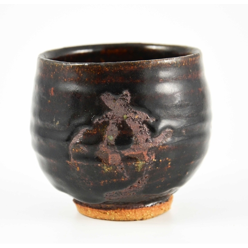 1427 - Jeremy Leach (attributed), a studio pottery tea bowl or vase, circa 1954, tenmoku glazed with unglaz... 