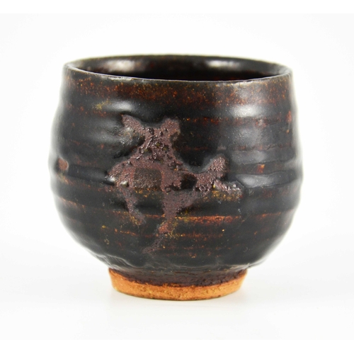 1427 - Jeremy Leach (attributed), a studio pottery tea bowl or vase, circa 1954, tenmoku glazed with unglaz... 