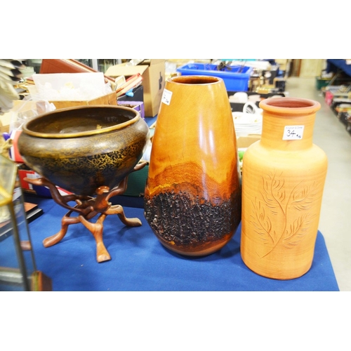 34 - A hexagonal vivarium,  brass persian style bowl on folding stand, a wooden vase and a terracotta vas... 