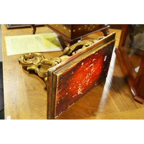 62 - A late 19th Century giltwood wall bracket, 42.5cm high, shelf 24cm x 40cm