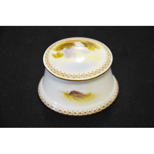 226 - J Allen for Royal Worcester, circular pill box, the lid decorated with a bullfinch on cherry blossom... 