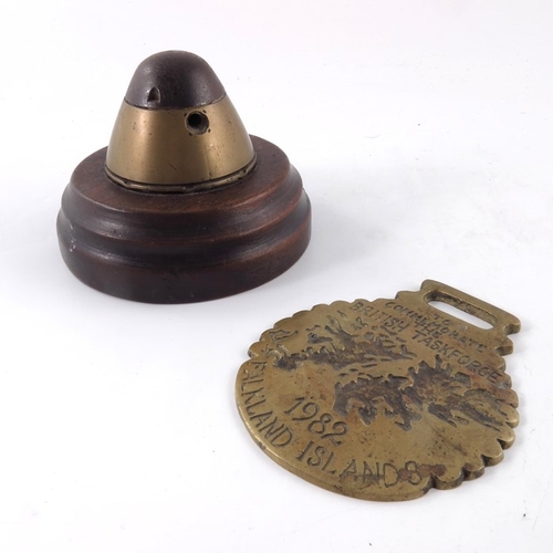 251a - First World War German shell fuze head, 1914, marked 'KZ14 O EEC 15 339', on wooden circular base, t... 