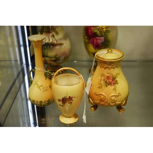 297 - A Royal Worcester twin handled blush ivory vase, teardrop form, decorated with thistles and flowers ... 