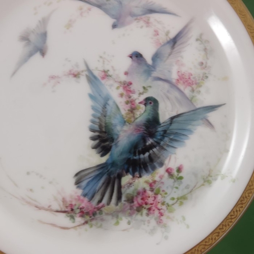 307 - Charles Baldwin (attributed) for Royal Worcester, a painted plate, 1907, decorated with doves in fli... 