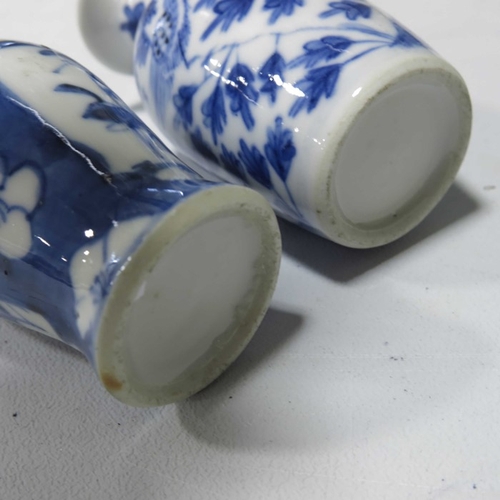 324 - A miniature blue and white inverse baluster form vase and another example.  (2)