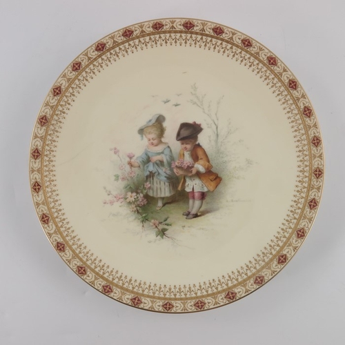 356 - Antonin Boullemier for Minton, a pair of painted plates, each with a boy and birl in 18th century co... 