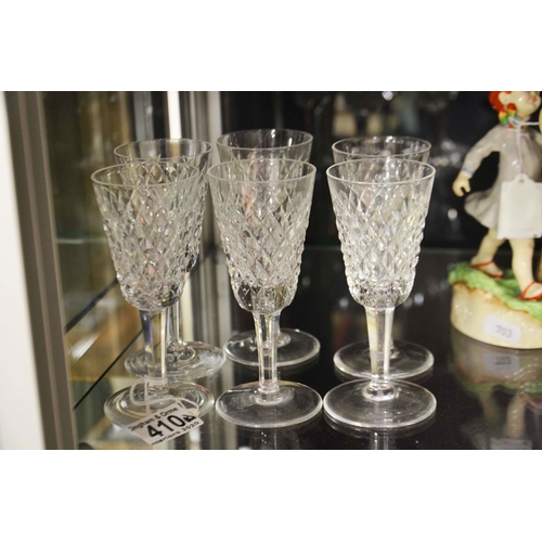 410 - A set of six Waterford crystal Alana pattern sherry glasses, hobnail cut, acid marks, 13cm high  (6)