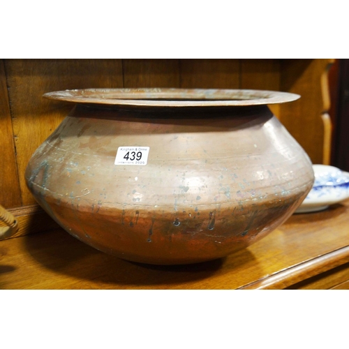 439 - Middle Eastern copper bowl, compressed globular shape, resting on a plain convex base, rising to nar... 