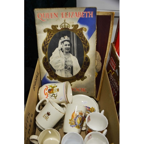 444 - Commemorative ware, to include pottery cups and tankards, Queen Elizabeth scrap books and Royal fami... 