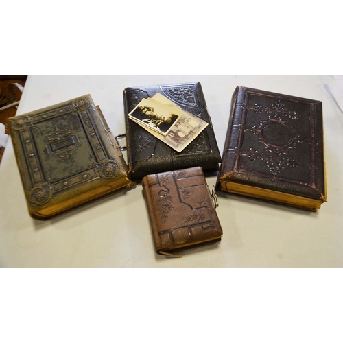 453 - Four Victorian photograph albums and contents.