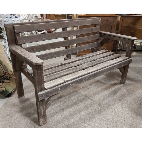 683 - A wooden garden bench, 125cm long, 59cm deep, 80cm high