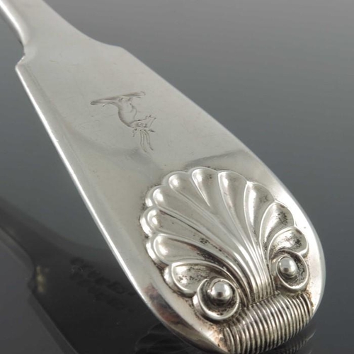 60 - A William IV silver ladle, William Theobalds, London 1832, double struck Fiddle and Shell pattern, 3... 