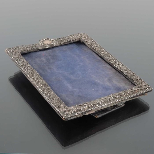 76 - A Victorian silver photo frame, Deakin and Francis, Birmingham 1898, rectangular form, reticulated a... 