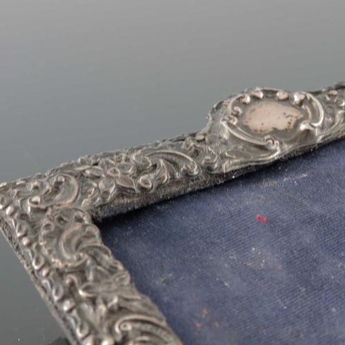 76 - A Victorian silver photo frame, Deakin and Francis, Birmingham 1898, rectangular form, reticulated a... 